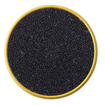 Close-up of Canadian black pike roe caviar in a container on a white background