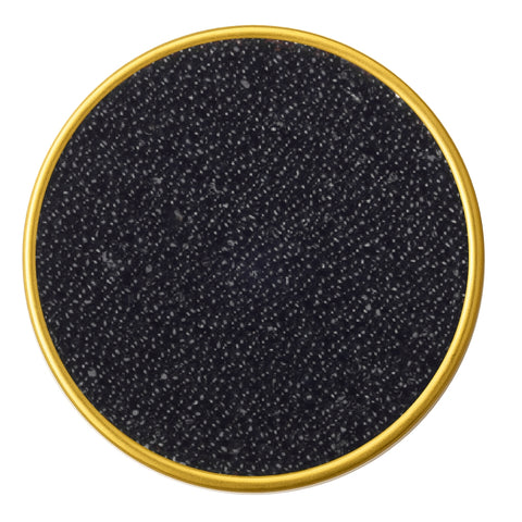 Close-up of Canadian black pike roe caviar in a container on a white background