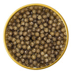 Close-up of a container with Royal Osetra Malossol Black Caviar on a white background