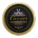 A golden tin can of American paddlefish caviar labeled 'Caviar Paddlefish Malossol' with a brand. View from Top